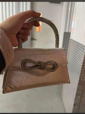 Metallic Rose Gold Mini Top-Handle Bag with Embellished Bow